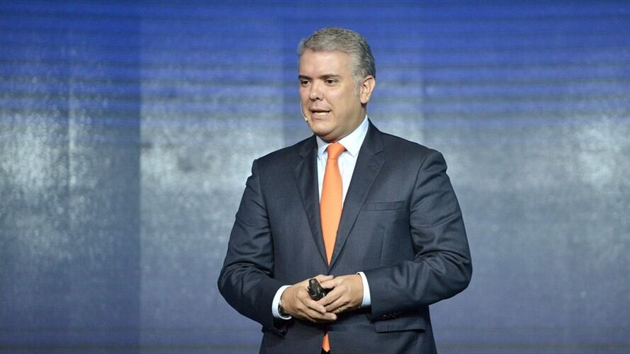 Duque respondió a manifestante boliviano que lo llamó paramilitar. Foto: Getty