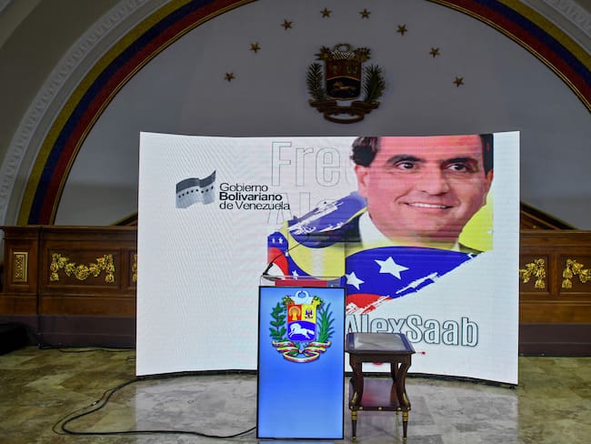 The image of Colombian businessman Alexander Saab is projected on a screen at the National Assembly, in Caracas on October 16, 2021, before a press conference. (Photo by Federico PARRA / AFP) (Photo by FEDERICO PARRA/AFP via Getty Images)