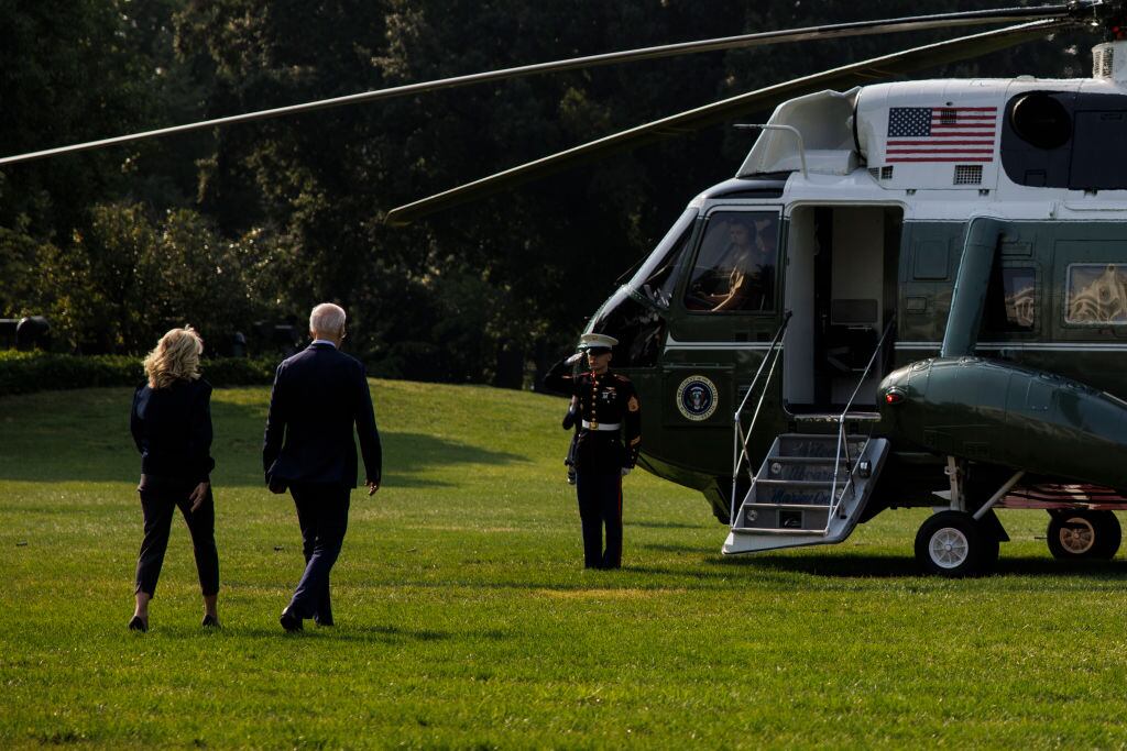 WASHINGTON, DC - SEPTEMBER 17: U.S. President Joe Biden and first lady Jill Biden walk to Marine One on the South Lawn of the White House on September 17, 2022 in Washington, DC. The Bidens are traveling to the United Kingdom to attend the funeral of the late Queen Elizabeth II. (Photo by Samuel Corum/Getty Images)