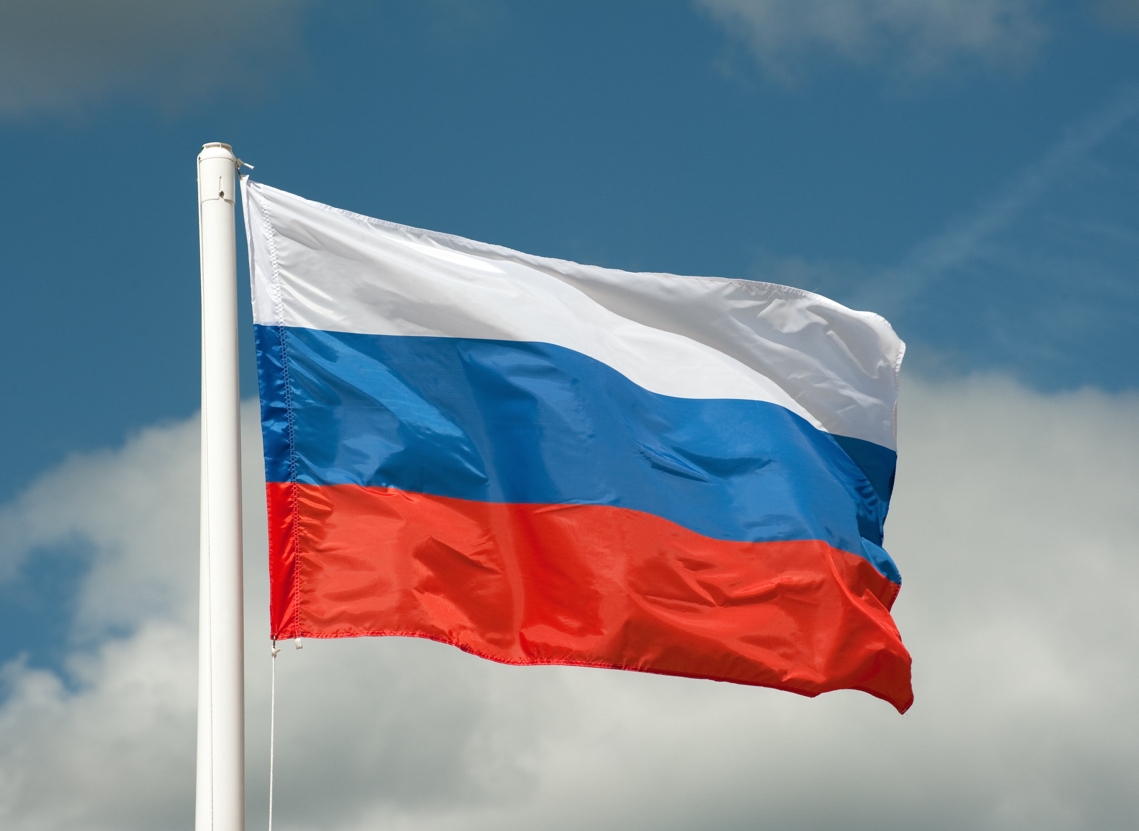 The flag of Russia waving in the wind. Photo: Getty Images.