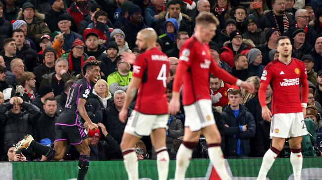 Manchester (United Kingdom), 12/12/2023.- Kingsley Coman (L) of Bayern Munich celebrates after scoring the opening goal during the UEFA Champions League group match between Manchester United and FC Bayern Munich, in Manchester, Britain, 12 December 2023. (Liga de Campeones, Reino Unido) EFE/EPA/ADAM VAUGHAN