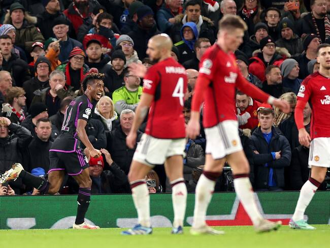 Manchester (United Kingdom), 12/12/2023.- Kingsley Coman (L) of Bayern Munich celebrates after scoring the opening goal during the UEFA Champions League group match between Manchester United and FC Bayern Munich, in Manchester, Britain, 12 December 2023. (Liga de Campeones, Reino Unido) EFE/EPA/ADAM VAUGHAN