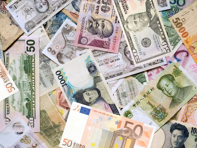 Referencia de monedas internacionales. Foto: Getty Images