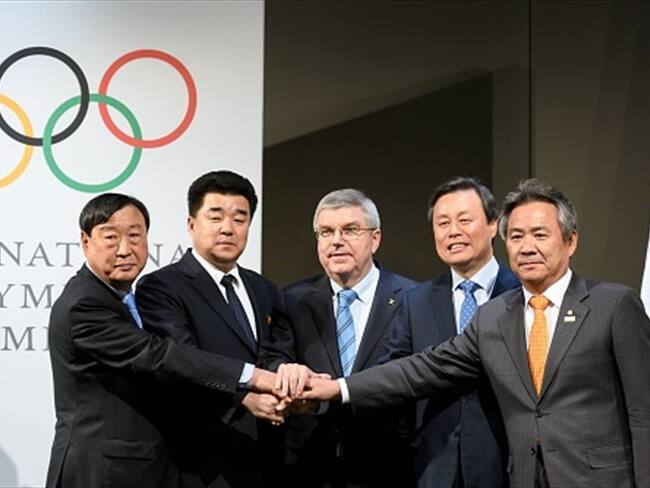 ASIA Las dos Coreas desfilarán juntas en los Juegos de 2018, que contarán con 22 norcoreanos en tres deportes FRANCE PRESSE Lausana. Foto: Getty Images