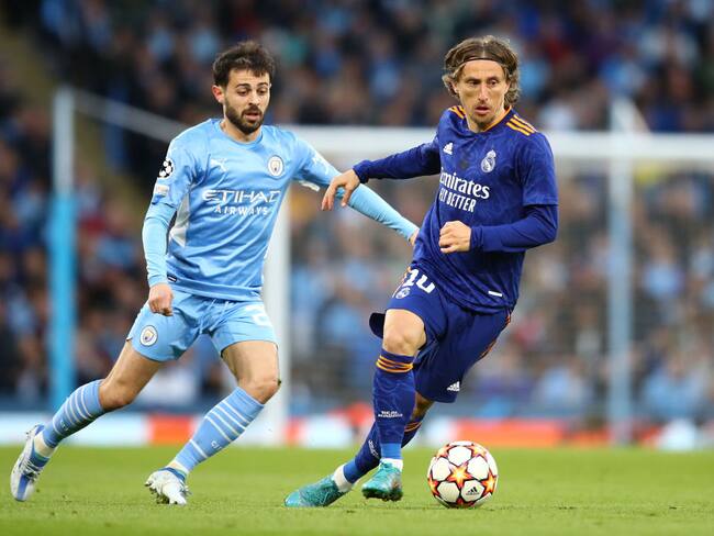Bernardo Silva del Manchester City y Luka Modric del Real Madrid. (Photo by Chris Brunskill/Fantasista/Getty Images)
