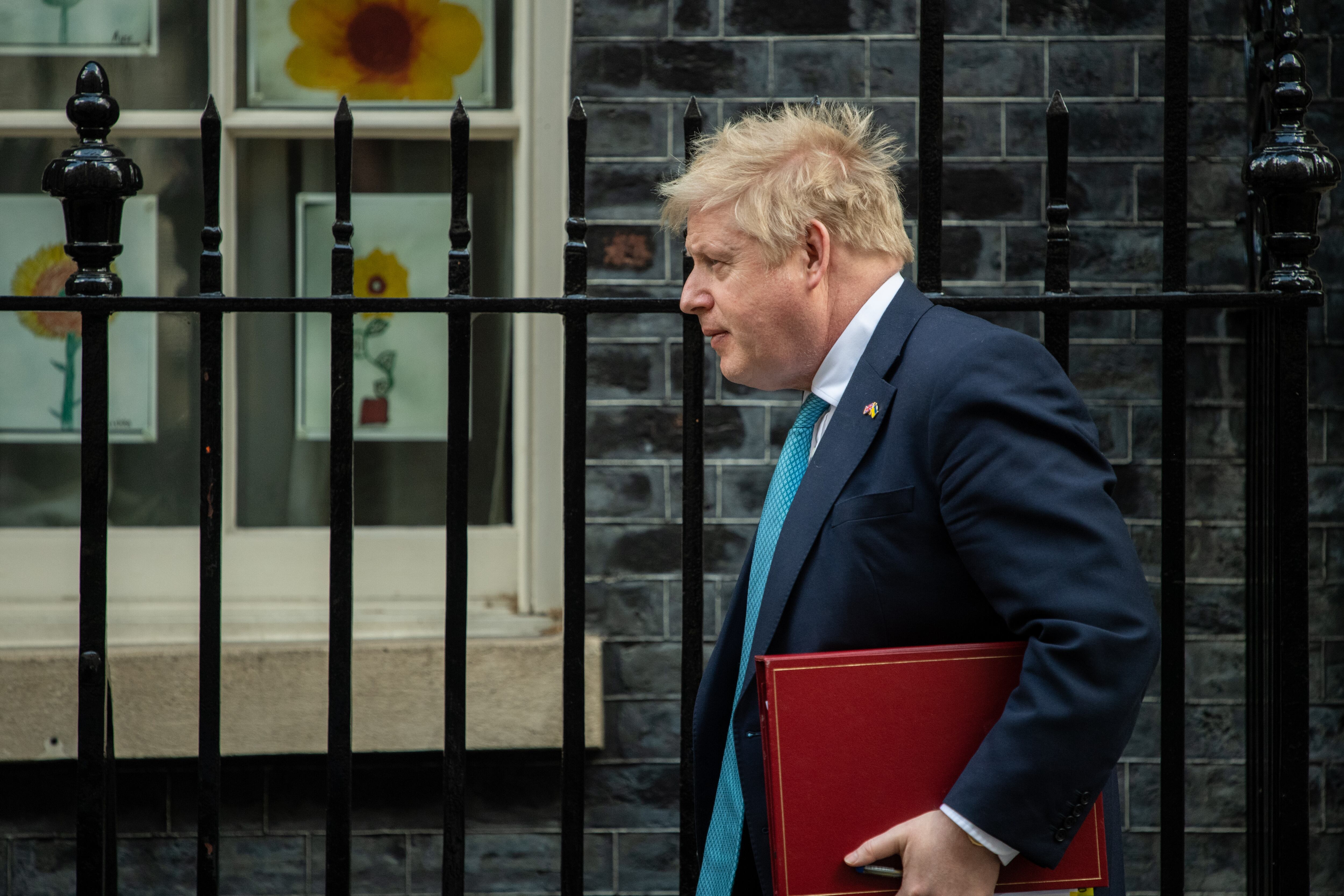 LONDON, ENGLAND - MARCH 09: British Prime Minister, Boris Johnson, leaves Downing Street to attend Prime Ministers Questions at the Houses of Parliament on March 9, 2022 in London, England. (Photo by Chris J Ratcliffe/Getty Images)