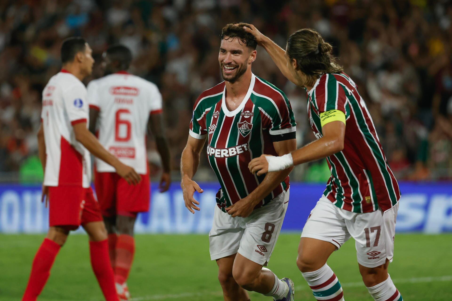 AME1808. RÍO DE JANEIRO (BRASIL), 19/08/2025.- Martinelli (c) de Fluminense celebra su gol este martes, en un partido de los octavos de final de la Copa Sudamericana entre Fluminense y América en el estadio Maracaná en Río de Janeiro (Brasil). EFE/ Antonio Lacerda