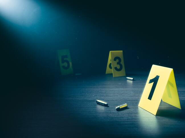 High contrast image of a crime scene with evidence markers