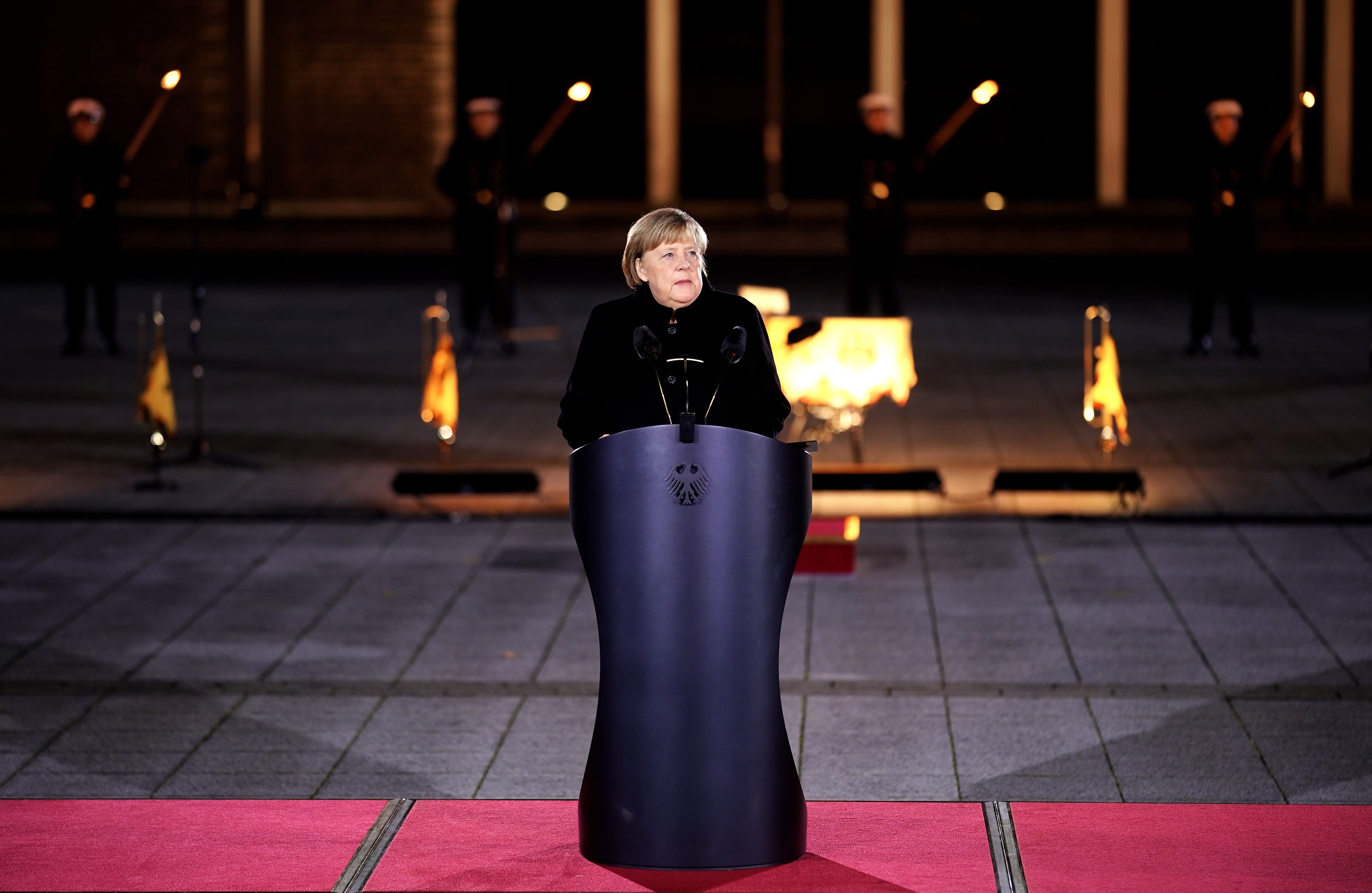 BERLIN, GERMANY - DECEMBER 02: Outgoing German Chancellor Angela Merkel delivers a speech as she attends her military tattoo ceremony hosted by the Bundeswehr in Berlin, Germany. (Photo by Friedemann Vogel - Pool/Getty Images)