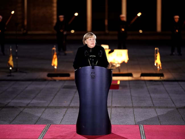 BERLIN, GERMANY - DECEMBER 02: Outgoing German Chancellor Angela Merkel delivers a speech as she attends her military tattoo ceremony hosted by the Bundeswehr in Berlin, Germany. (Photo by Friedemann Vogel - Pool/Getty Images)