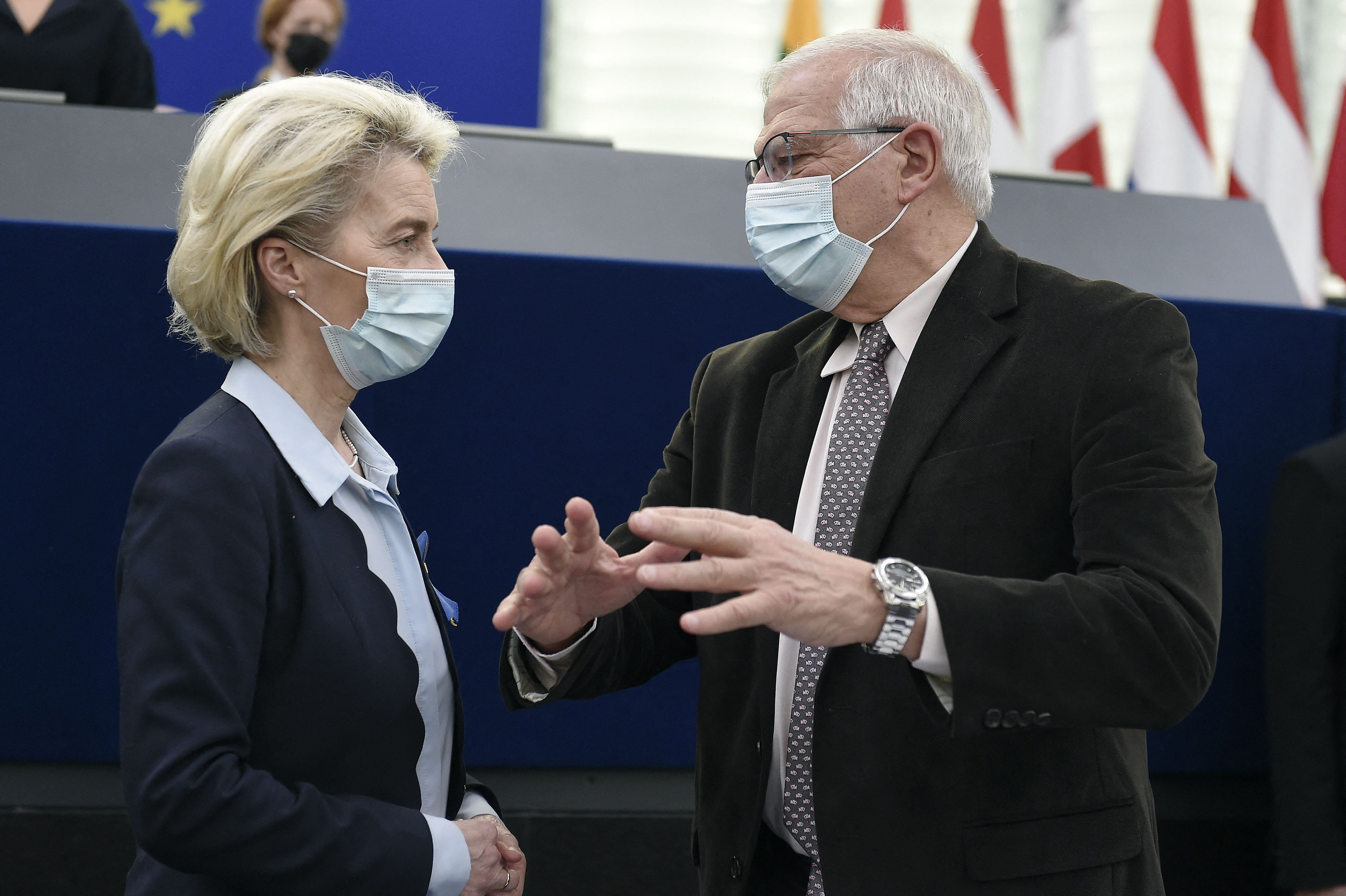 European Commission President Ursula von der Leyen (L) speaks with European Union foreign policy chief Josep Borrell ahead of a debate on the conclusions of the European Council meeting regarding Russian invasion of Ukraine during a plenary session at the European Parliament in Strasbourg, eastern France, on April 6, 2022. - EU leaders on April 6, 2022 said the bloc will soon have to sanction all of Russia's hydrocarbon exports as they blamed Moscow for "war crimes" discovered in Ukraine, especially in the town of Bucha. (Photo by FREDERICK FLORIN / AFP) (Photo by FREDERICK FLORIN/AFP via Getty Images)