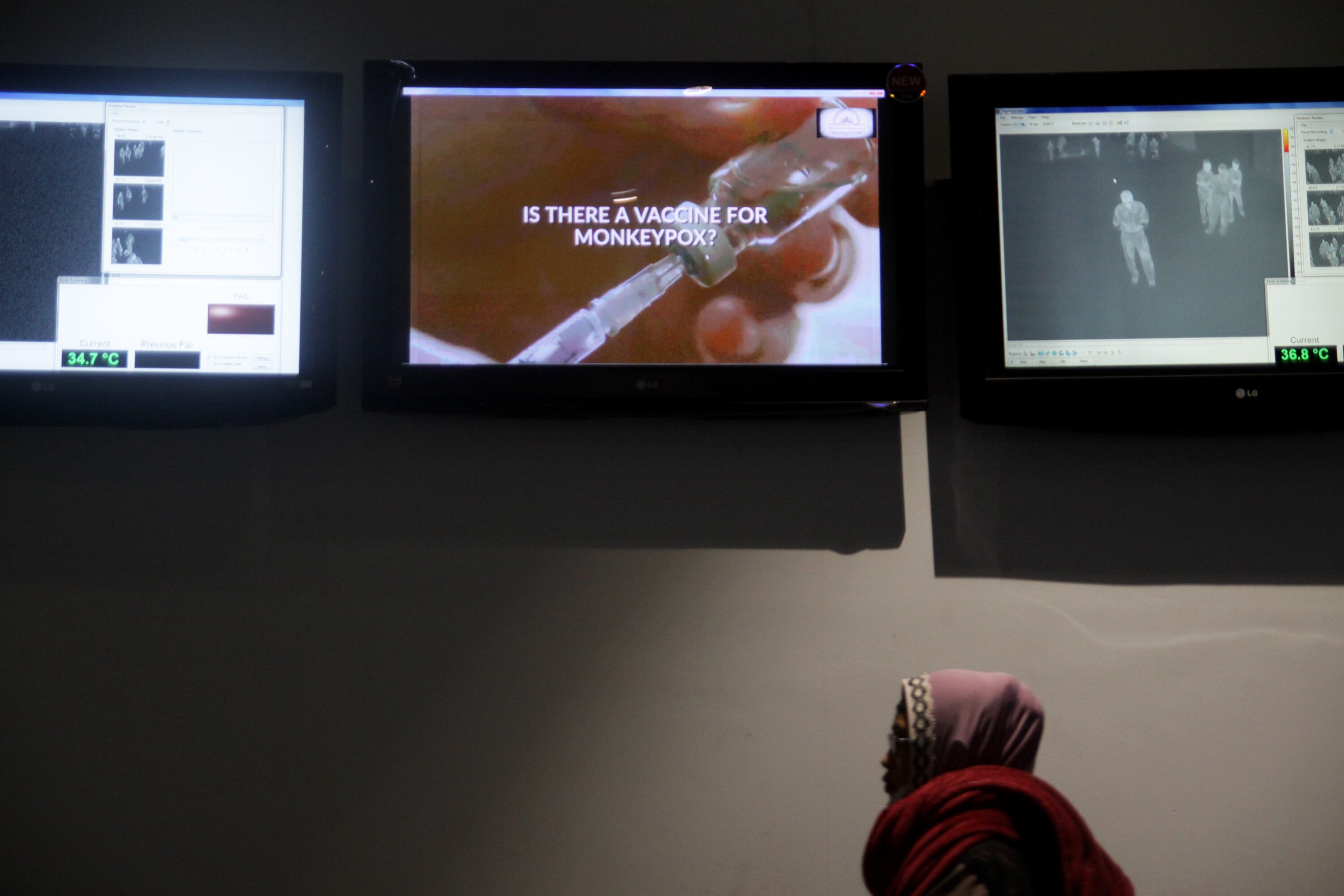 Passenger passing through the thermal monitor shows the body temperature at international arrival gate of Soekarno-Hatta International Airport, Tangerang, Banten priovince, on Wednesday, May 15, 2019. The Port Quarantine Health of Soekarno-Hatta International Airport conduct the checking bodytemperature procedure to all abroad passengers to prevent the spread of the MonkeyPox virus which recently infected a Nigerian in Singapore. (Photo by Aditya Irawan/NurPhoto via Getty Images)