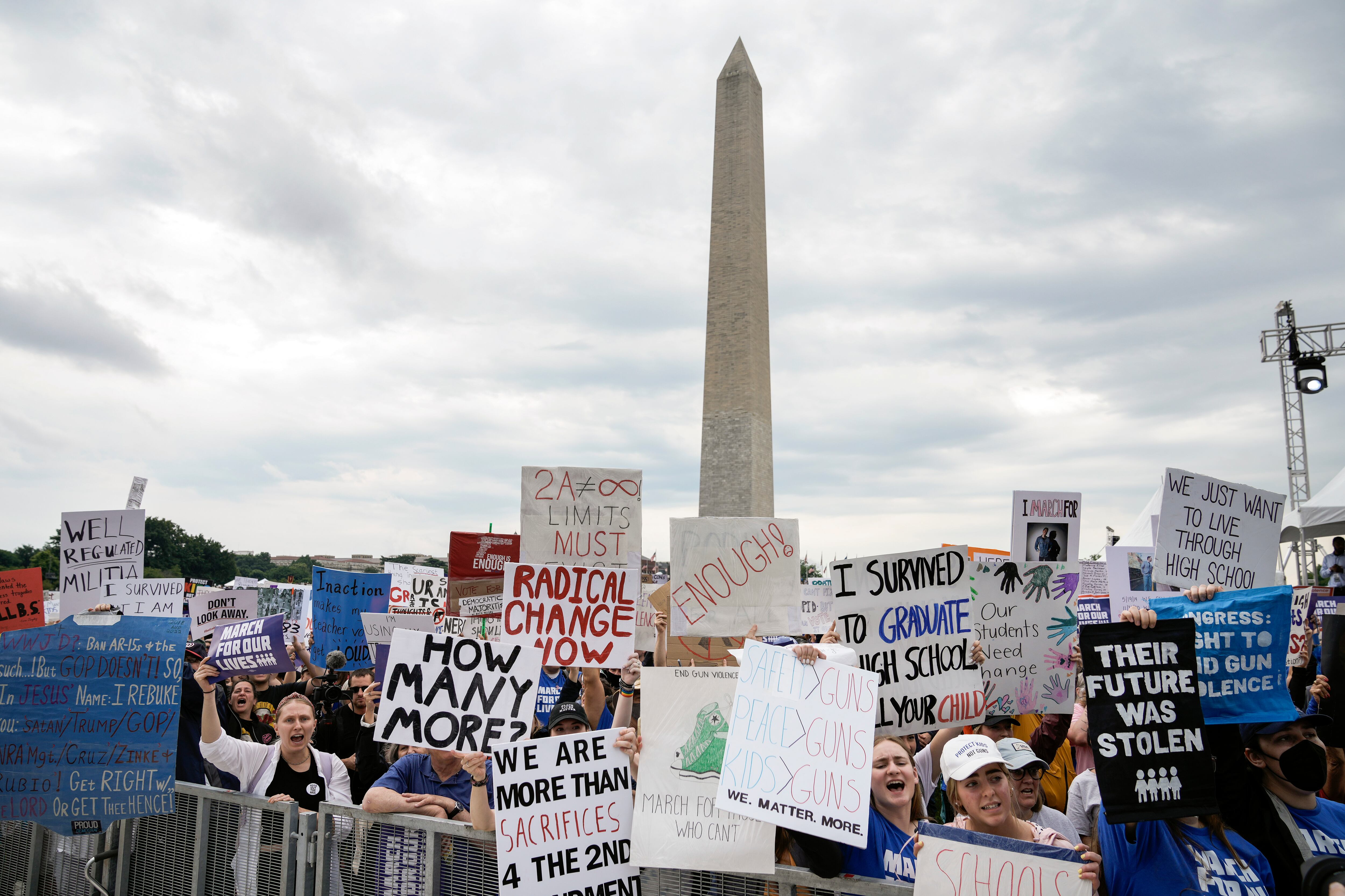 WASHINGTON, DC - JUNE 11: Demonstrators attend a March for Our Lives rally against gun violence on the National Mall June 11, 2022 in Washington, DC. The March For Our Lives movement was spurred by the shooting at Marjory Stoneman Douglas High School in Parkland, Florida, in 2018. After recent mass shootings in Buffalo, New York and Uvalde, Texas, a bipartisan group of Senators continue to negotiate a potential compromise deal on gun violence and gun safety legislation. (Photo by Drew Angerer/Getty Images)