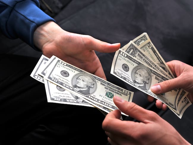 Imagen de refrencia de dólar. Foto: Wakila / Getty Images