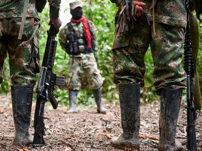 Imagen de referencia de hombres armados. (Photo by RAUL ARBOLEDA/AFP via Getty Images)