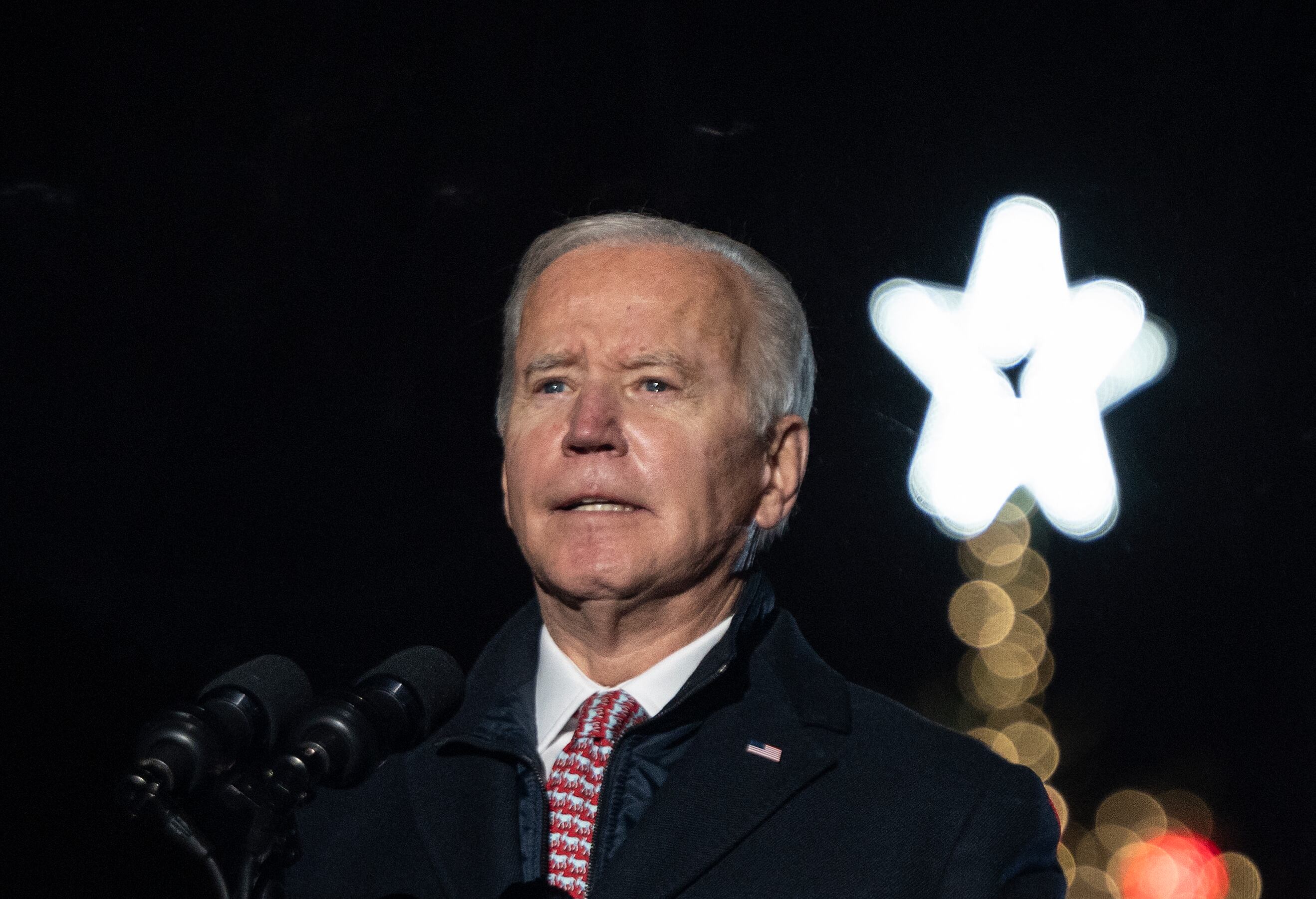US President Joe Biden speaks as he and first lady Jill Biden attend the National Christmas Tree lighting ceremony held by the National Park Service at the Ellipse near the White House, on December 2, 2021 in Washington, DC. (Photo by ANDREW CABALLERO-REYNOLDS / AFP) (Photo by ANDREW CABALLERO-REYNOLDS/AFP via Getty Images)