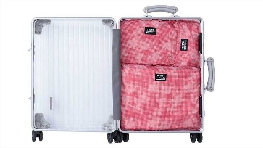Las maletas transparentes que desafían los prejuicios frente a colombianos en el exterior. Foto: Totto
