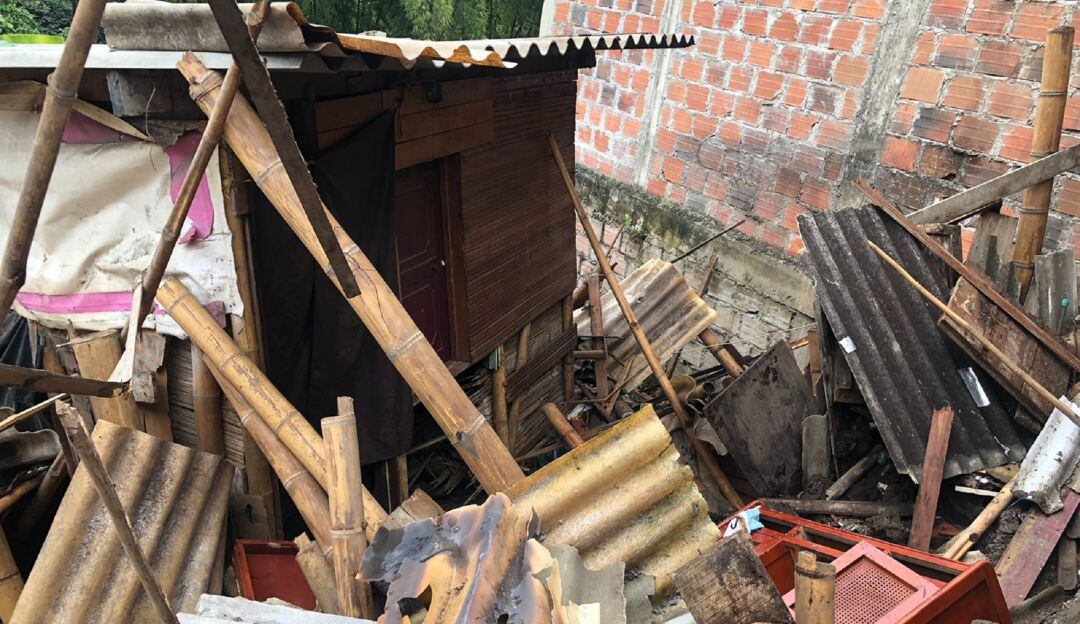 Vivienda colapsada .