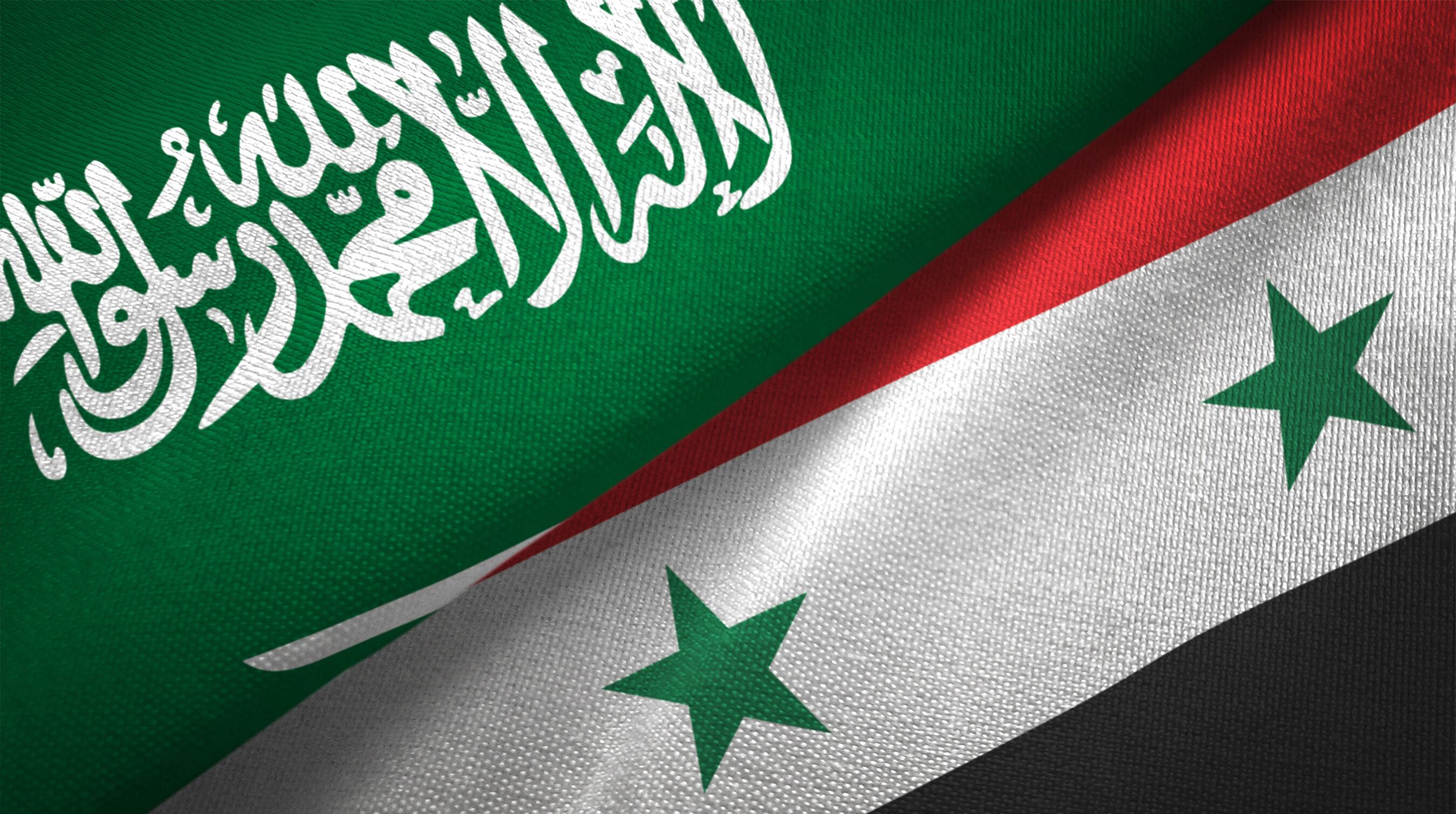 Bandera de Arabia Saudita y Siria. I Foto: getty Images.