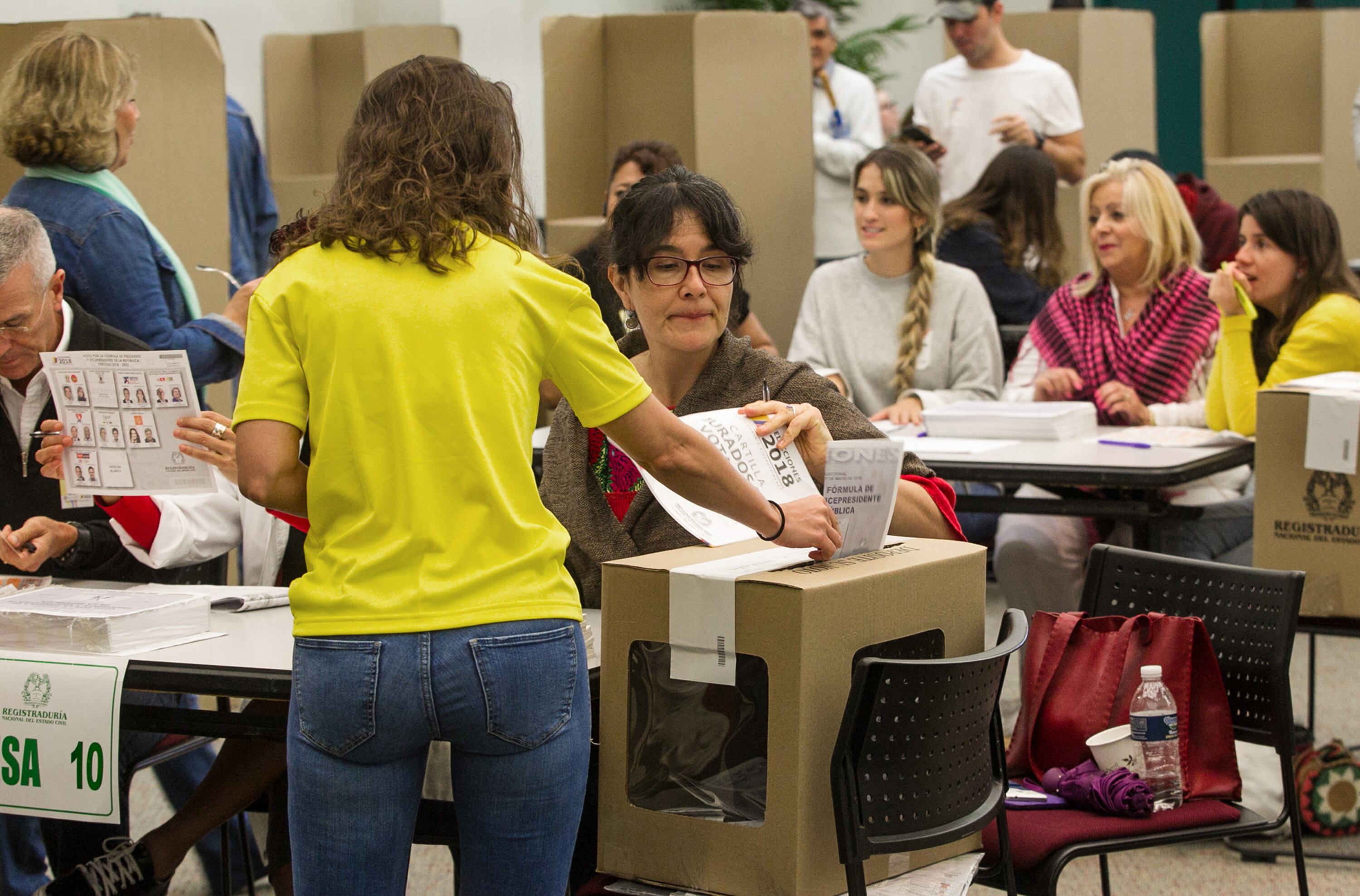 Colombians in Miami, Fla. vote in the first round of the Colombian presidential elections at Miami-Dade Wolfson Campus on Sunday, May 27, 2018. Even though the weather was very wet due to tropical storm Alberto, turnout was good. (C.M. Guerrero/Miami Herald/Tribune News Service via Getty Images)