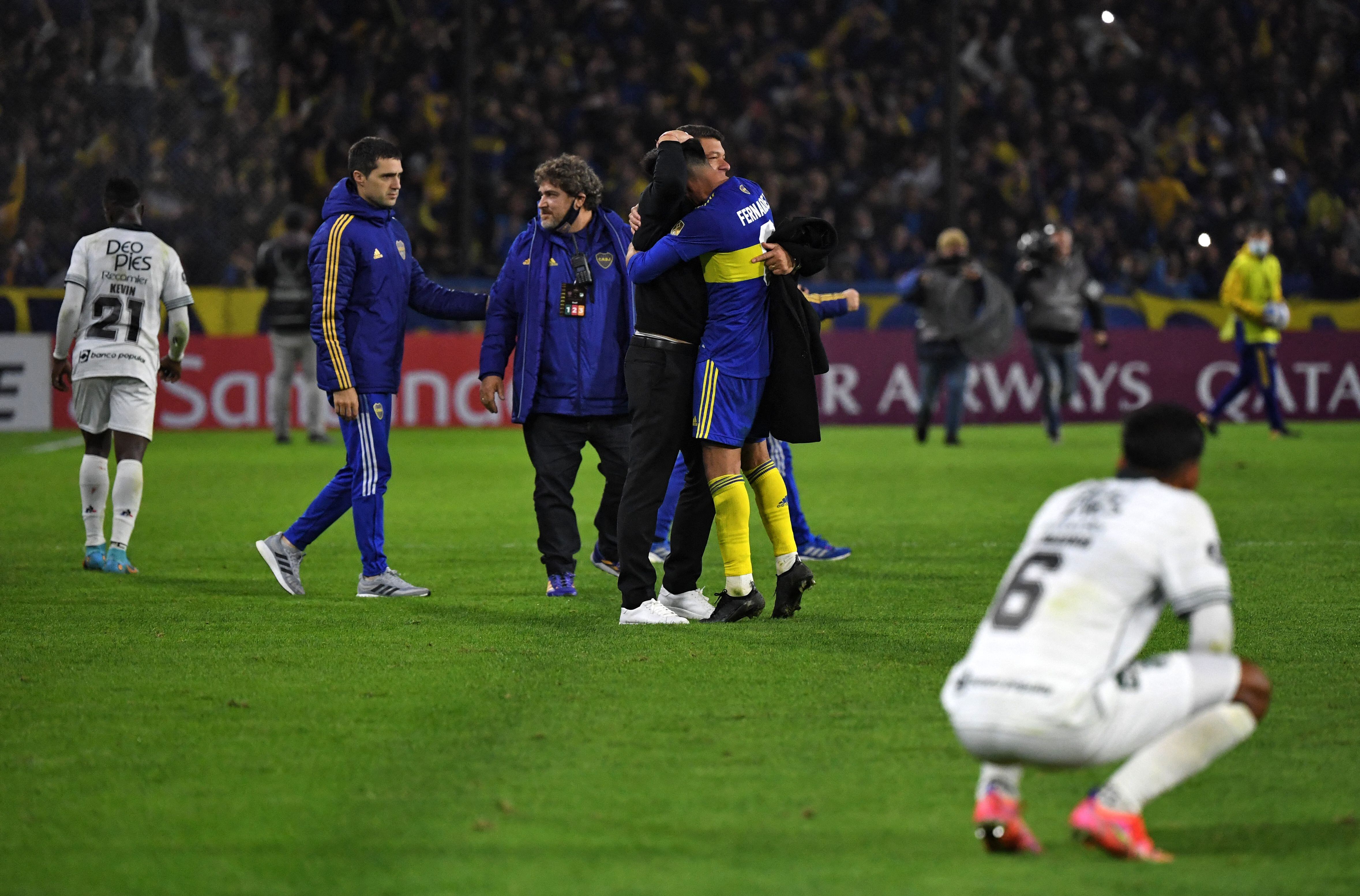 Argentina's Boca Juniors players celebrate after defeating Colombia's Deportivo Cali during their Copa Libertadores group stage football match, at La Bombonera stadium in Buenos Aires, on May 26, 2022. (Photo by Luis ROBAYO / AFP) (Photo by LUIS ROBAYO/AFP via Getty Images)