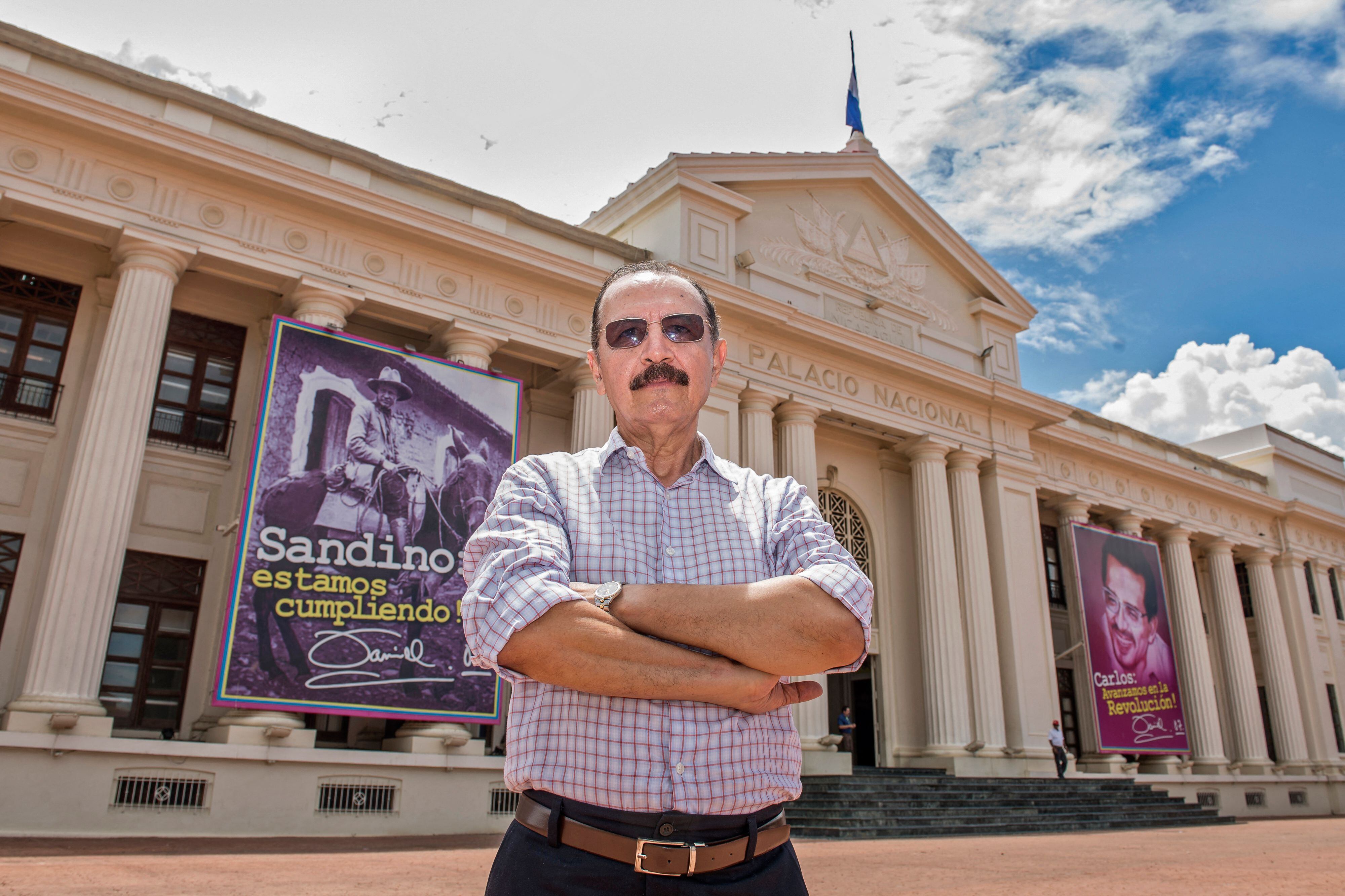 Nicaraguan retired Army General Hugo Torres, former Sandinista Renovation Movement member, and current member of the Unamos party, poses outside the National Palace in Managua on October 03, 2017. - Former guerrilla Hugo Torres Jimenez, one of the 46 opponents of Daniel Ortega's government imprisoned in Nicaragua, died on February 12, 2022 his relatives said in a statement, without giving further details. (Photo by Oscar NAVARRETE / AFP) (Photo by OSCAR NAVARRETE/AFP via Getty Images)