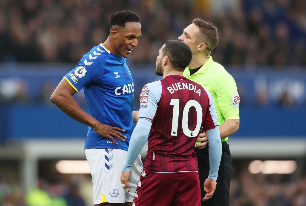 LIVERPOOL, ENGLAND - JANUARY 22: Yerry Mina of Everton speaks to Emiliano Buendia of Aston Villa during the Premier League match  (Photo by Jan Kruger/Getty Images)