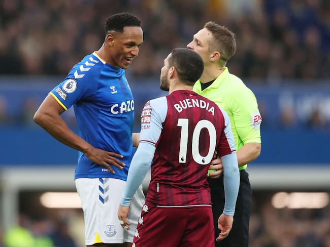 LIVERPOOL, ENGLAND - JANUARY 22: Yerry Mina of Everton speaks to Emiliano Buendia of Aston Villa during the Premier League match  (Photo by Jan Kruger/Getty Images)
