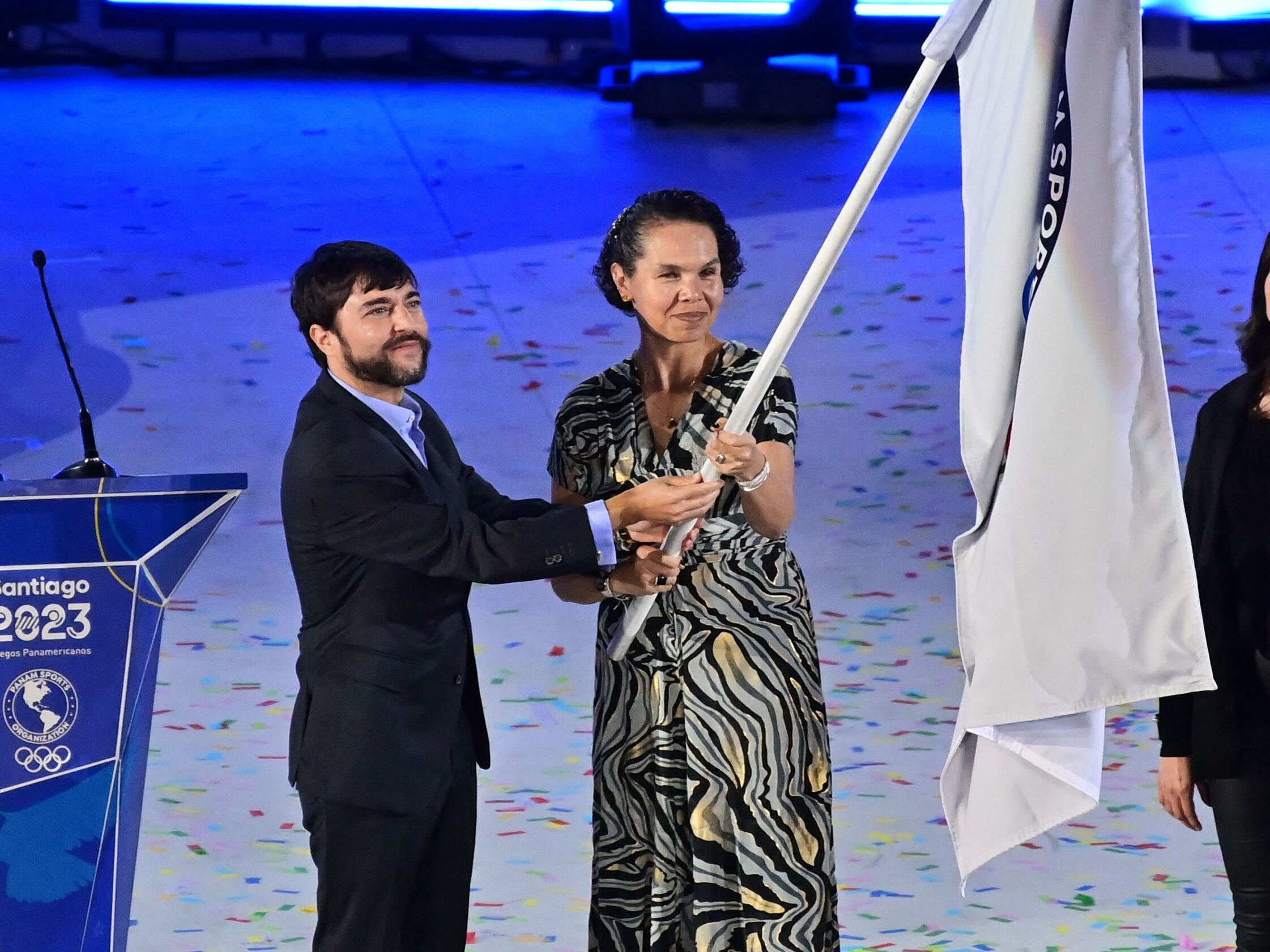 Jaime Pumarejo (izq.) y la ministra Astrid Rodriguez (der.). (Photo by Pablo VERA / AFP) (Photo by PABLO VERA/AFP via Getty Images)