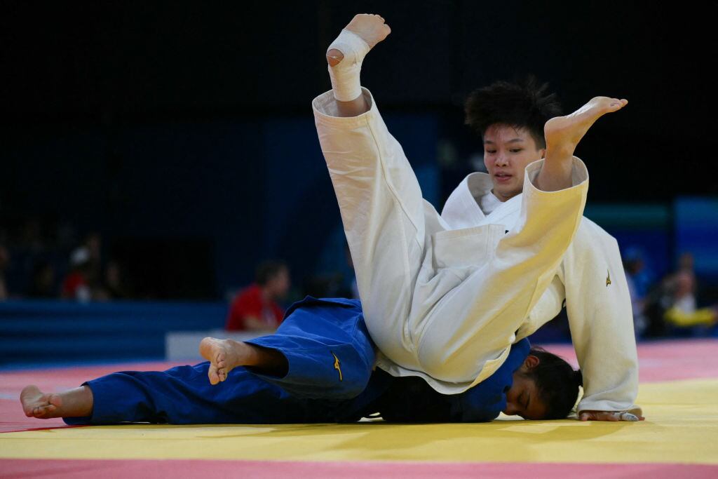 Erika Lasso de Colombia vs. Chen-Hao Lin de China Taipéi, dieciseisavos de final. Foto: LUIS ROBAYO/AFP via Getty Images