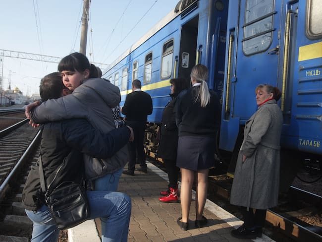 Ukrainians refugees board the train to Przemysl (Poland), amid Russian invasion of Ukraine, in Odesa, Ukraine 25 April 2022. (Photo by STR/NurPhoto via Getty Images)