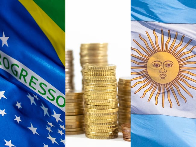 Banderas de Brasil y Argentina junto a monedas, imagen de referencia. Foto: Getty Images.
