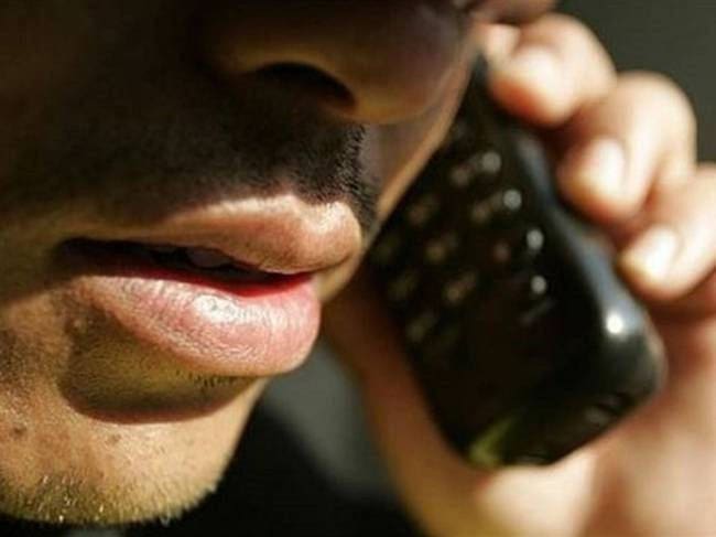 Imagen referencia de una extorsión. Foto: Colprensa.