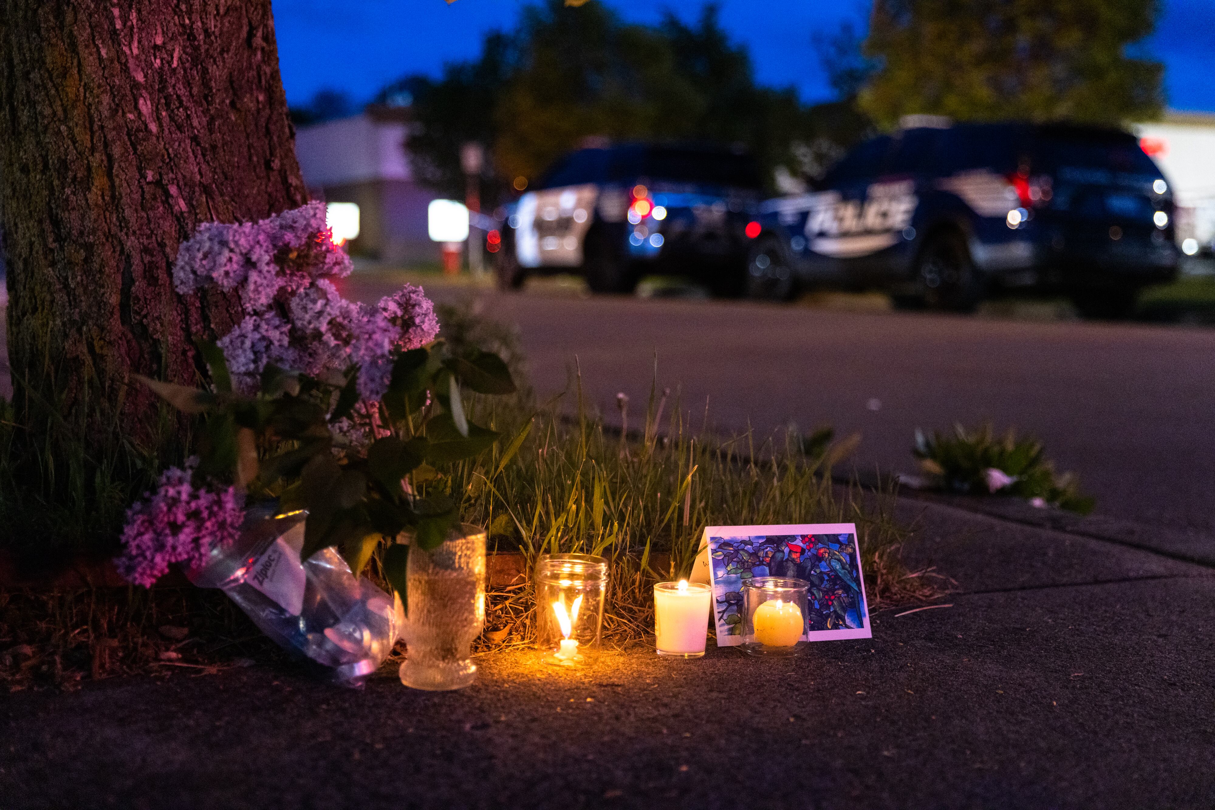 BUFFALO, NY - MAY 14: A small vigil set up across the street from a Tops grocery store on Jefferson Avenue in Buffalo, where a heavily armed 18-year-old White man entered the store in a predominantly Black neighborhood and shot 13 people, killing ten, Saturday, May 14, 2022. (Matt Burkhartt for The Washington Post via Getty Images)