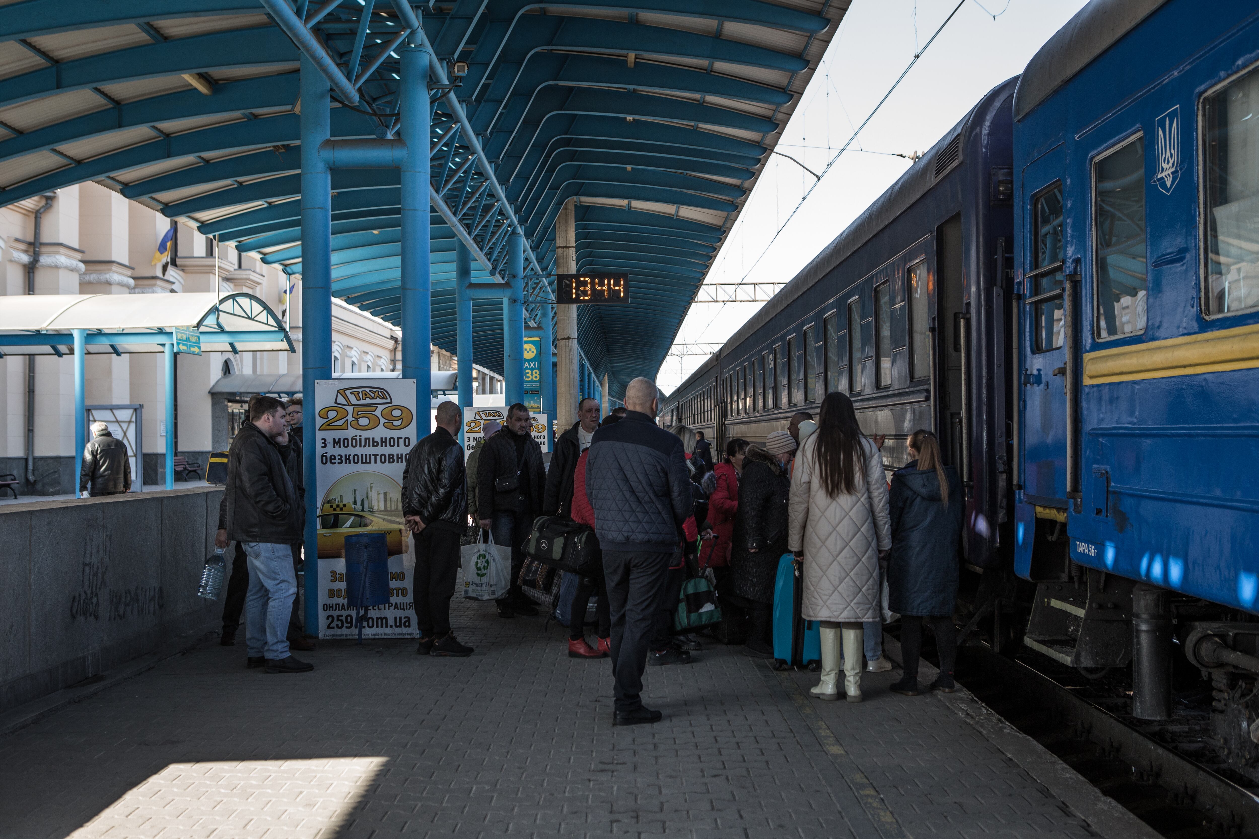 ZAPORIZHIA, UKRAINE - MARCH 23: Refugees coming mostly from the Mariupol area and arriving with the last humanitarian convoy consisting of 15 buses, take the train to the Zaporizhia station to continue their journey west in Zaporizhia, Ukraine on March 23, 2022. (Photo by Andrea Carrubba/Anadolu Agency via Getty Images)