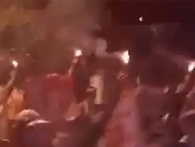 hinchas América. Foto: Tomada del video.