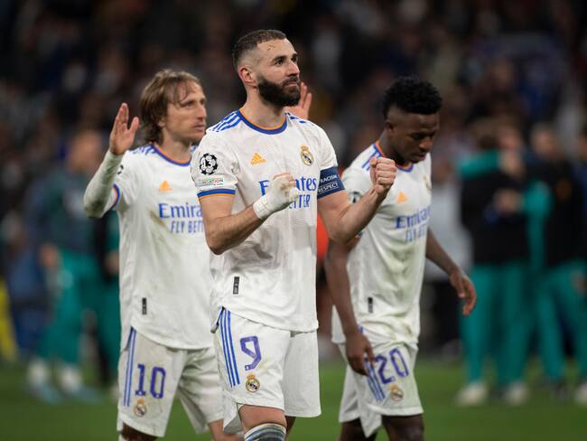 Karim Benzema , Luka Modric y Vinícius Júnior del Real Madrid (Photo by Visionhaus/Getty Images)