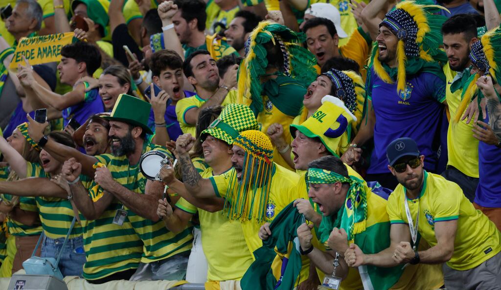 DOHA, QATAR - DECEMBER 05: Brazilian Fans during the FIFA World Cup Qatar 2022 Round of 16 match between Brazil and South Korea at Stadium 974 on December 05, 2022 in Doha, Qatar. (Photo by Richard Sellers/Getty Images)
