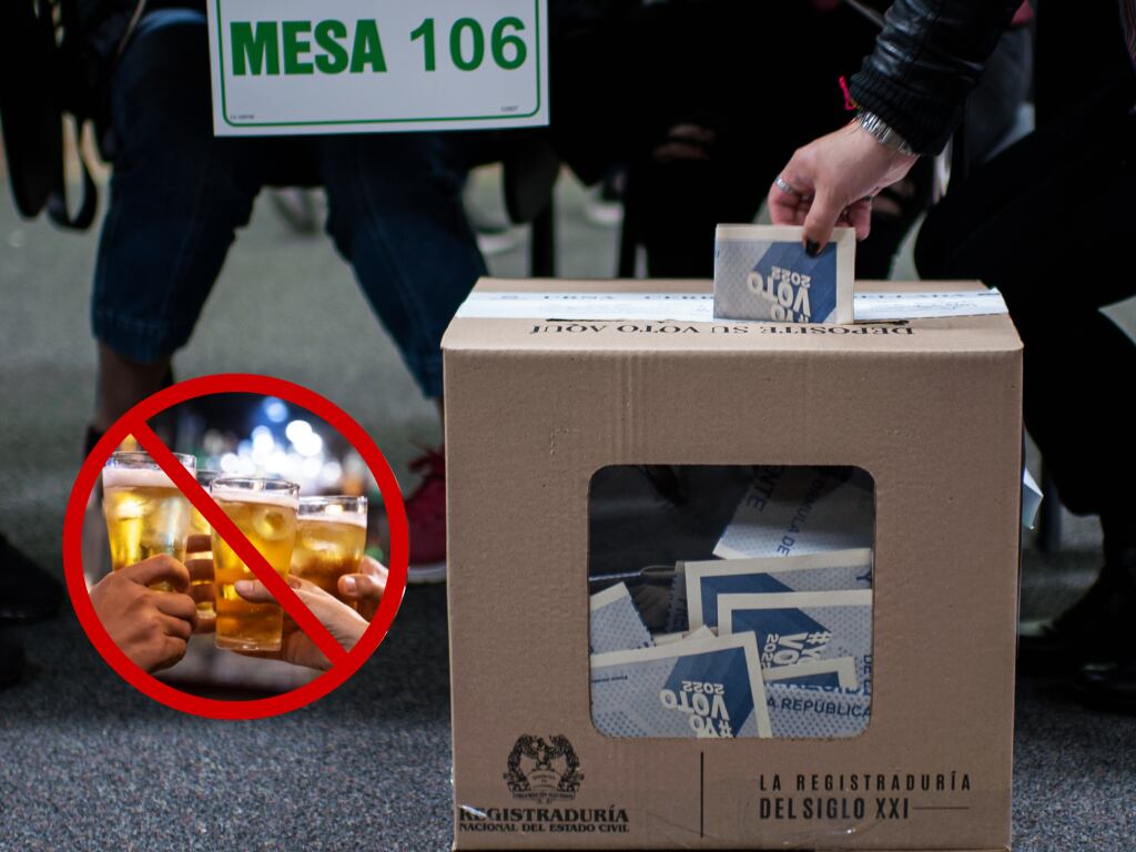 Persona participando en una jornada electoral colombiana y de fondo la prohibición de consumir alcohol (Fotos vía Getty Images)