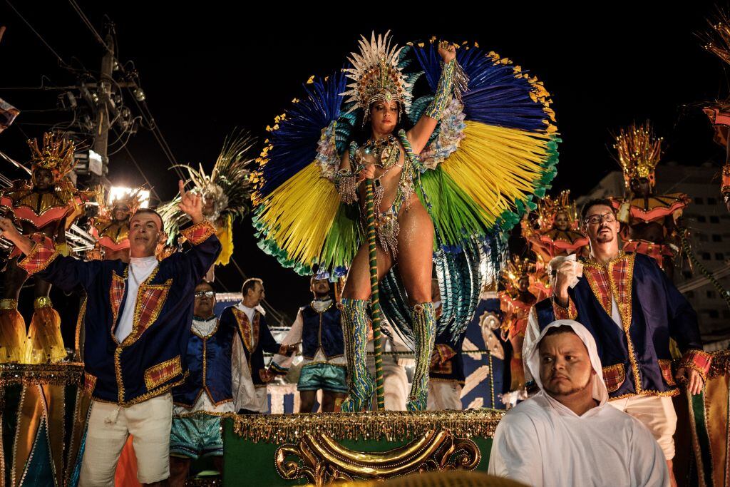 Revellers of Caprichosos de Pilares samba school (Serie B, the third division) perform during their parade on Intendente Magalhaes street in Rio de Janeiro, Brazil, on February 28, 2017.Only Special and Serie A groups of Samba schools are allowed to perform at Sambadrome and the rest of groups (Serie B to E) use the Intendente Magalhaes street which is opened to public for free. / AFP / Yasuyoshi Chiba        (Photo credit should read YASUYOSHI CHIBA/AFP via Getty Images)