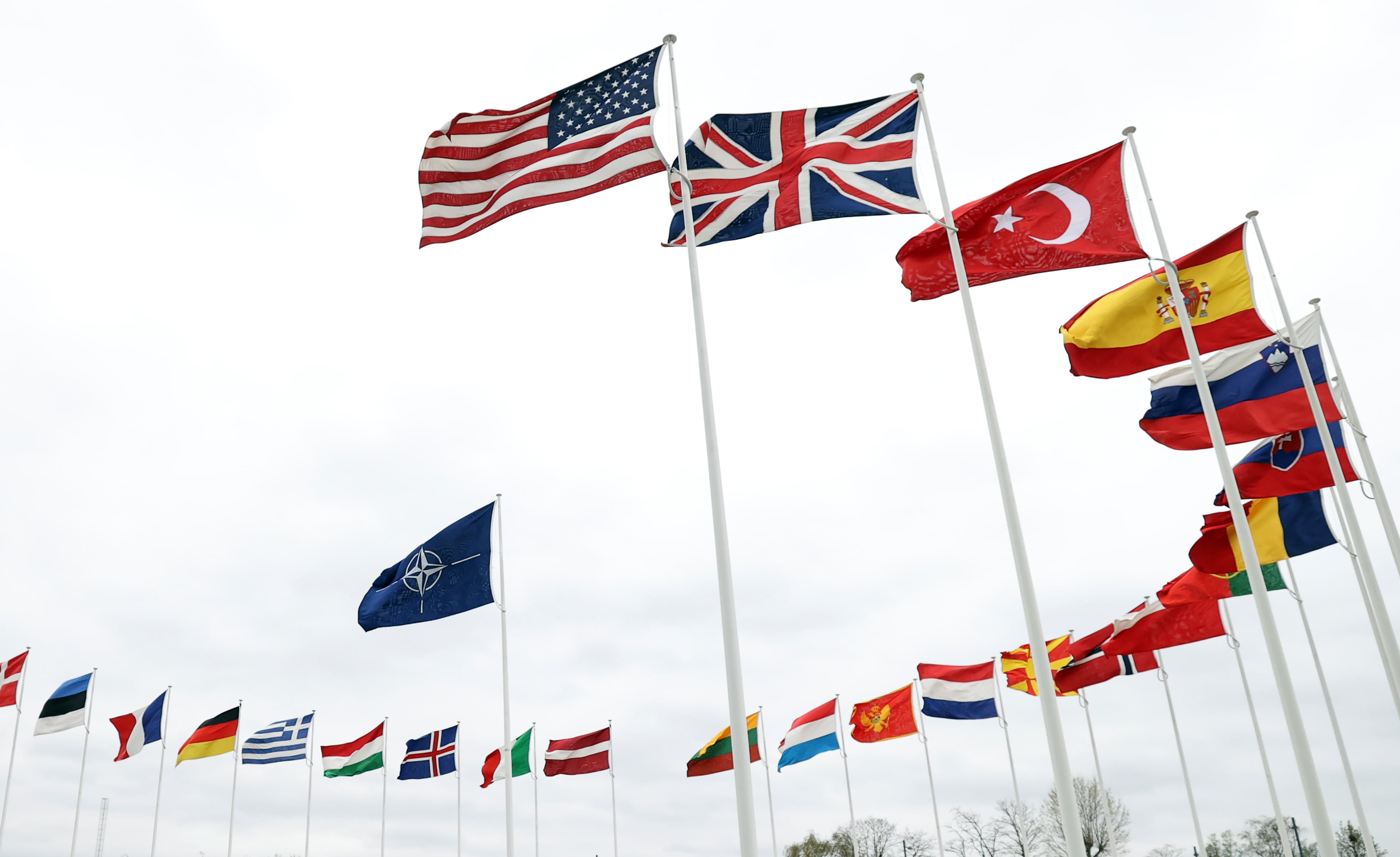 BRUSSELS, BELGIUM - APRIL 6: The flags of member countries of North Atlantic Treaty Organization (NATO) are seen ahead of NATO Foreign Ministers meeting at NATO Headquarters in Brussels, Belgium on April 6, 2022. (Photo by Dursun Aydemir/Anadolu Agency via Getty Images)