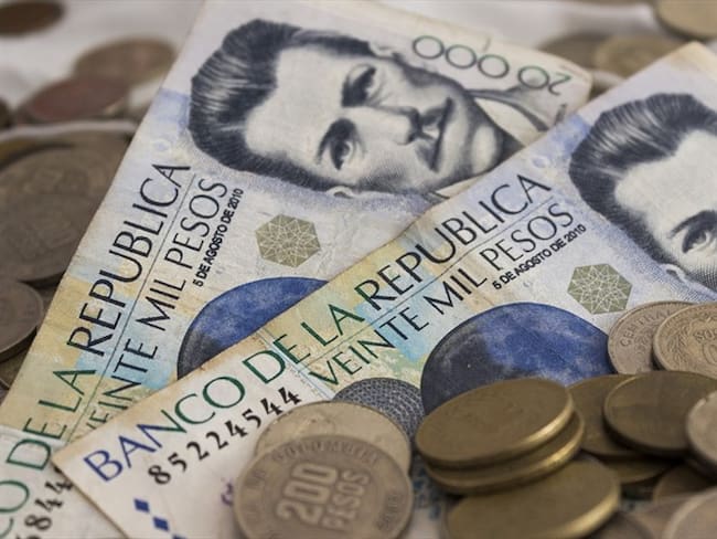 El presidente Iván Duque confirmó un aumento del salario mínimo del 6%, así como un incremento en el subsidio de transporte de 10%. Foto: Getty Images