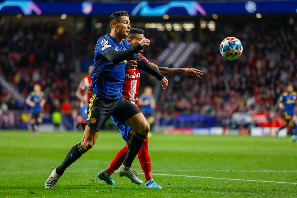 Cristiano Ronaldo y Renan Lodi / Getty Images