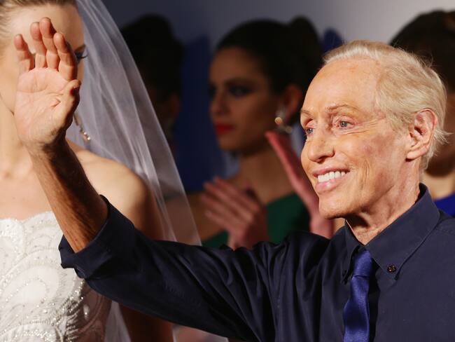 ROME, ITALY - JANUARY 26:  Designer Renato Balestra acknowledges the applause of the public after the Renato Balestra fashion show at Altaroma Altamoda on January 26, 2014 in Rome, Italy.  (Photo by Vittorio Zunino Celotto/Getty Images)