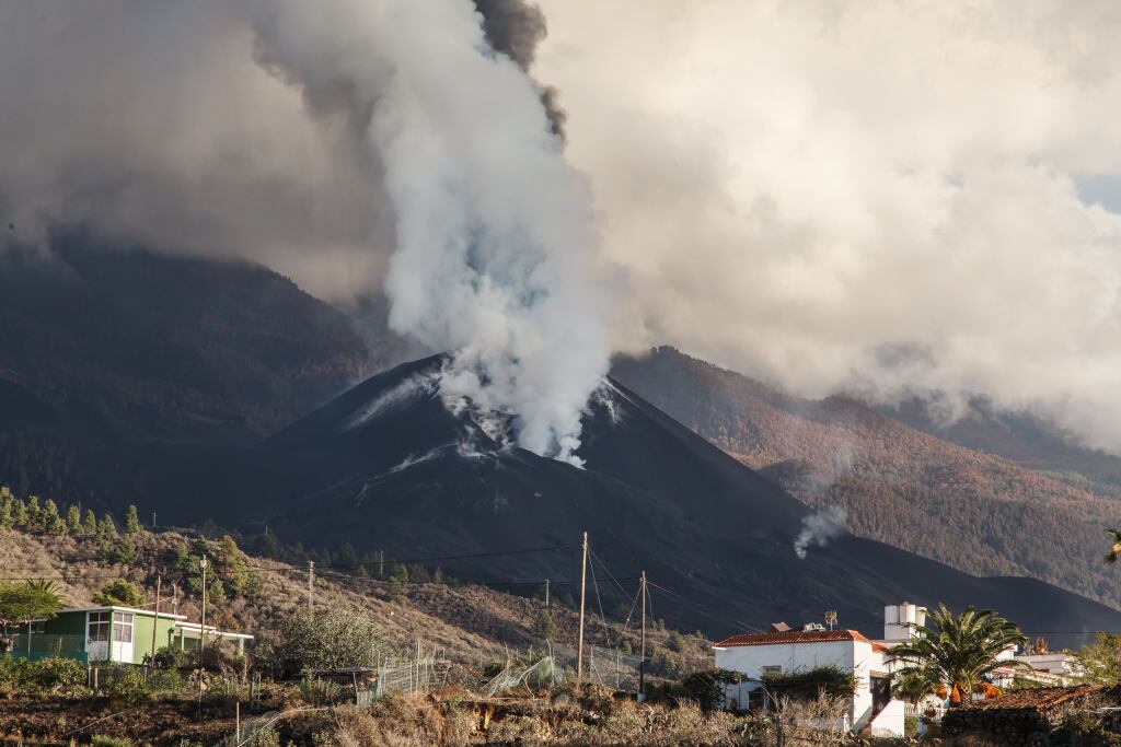 LA PALMA CANARY ISLANDS, SPAIN - NOVEMBER 19: Cumbre Vieja volcano, on 19 November, 2021 in La Palma, Santa Cruz de Tenerife, Canary Islands, Spain. The volcano currently has three active fronts, one that runs from Montaña Rajada to the north of Montaña Cogote -colada 11--, another that continues to feed the lava deltas and the third, the most intense one, which runs between lava flows 4 and 7. At a press conference, the deputy director of Pevolca, Ruben Fernandez, and the volcanologist of the IGN, Carmen Lopez, said it is occupying new space at the expense of homes and farms but has slowed and is advancing at about 20 meters per hour. In addition, it has also stopped the overflow of the main cone that was detected on Thursday night and caused an increase in the rate of emission of lava, very fluid, and the growth of its flow. (Photo By Europa Press via Getty Images)