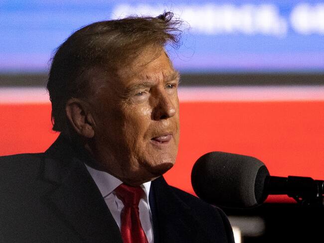 COMMERCE, GA - MARCH 26: (EDITOR'S NOTE: Alternative crop of image #1239538323) Former U.S. President Donald Trump speaks at a rally at the Banks County Dragway on March 26, 2022 in Commerce, Georgia. This event is a part of Trump's Save America Tour around the United States. (Photo by Megan Varner/Getty Images)