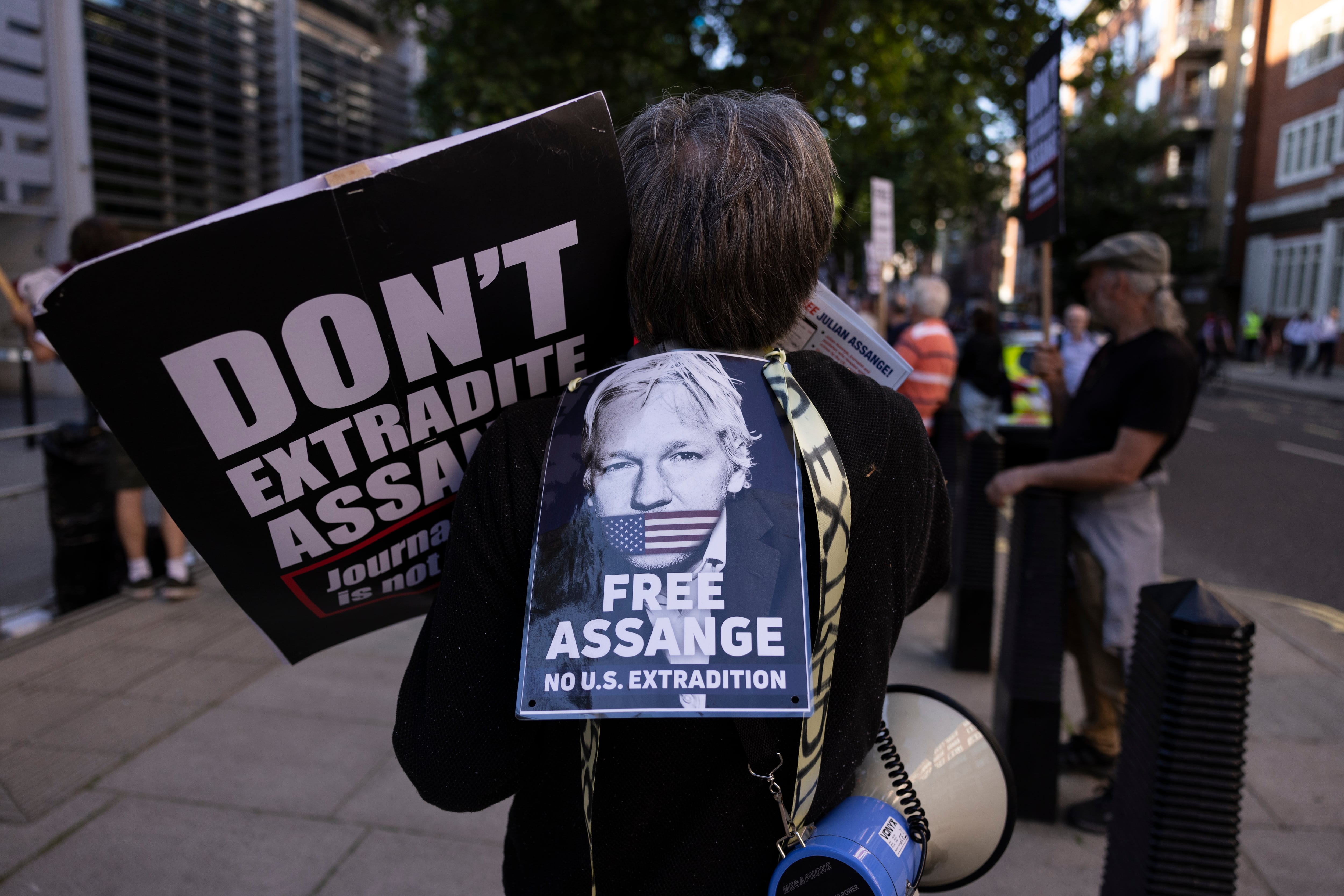 LONDON, ENGLAND - MAY 17: Protesters gather outside the Home Office to Demand Julian Assange's Immediate release on May 17, 2022 in London, England.  A UK court formally approved the extradition of Julian Assange to the US on espionage charges in April. The ultimate decision on his extradition lies with the UK's Home Secretary, Priti Patel.  (Photo by Dan Kitwood/Getty Images)