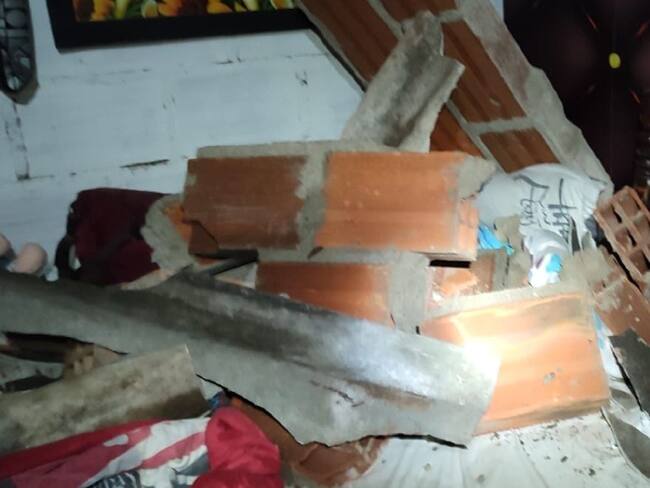 Muro desplomado/Cuerpo de bomberos