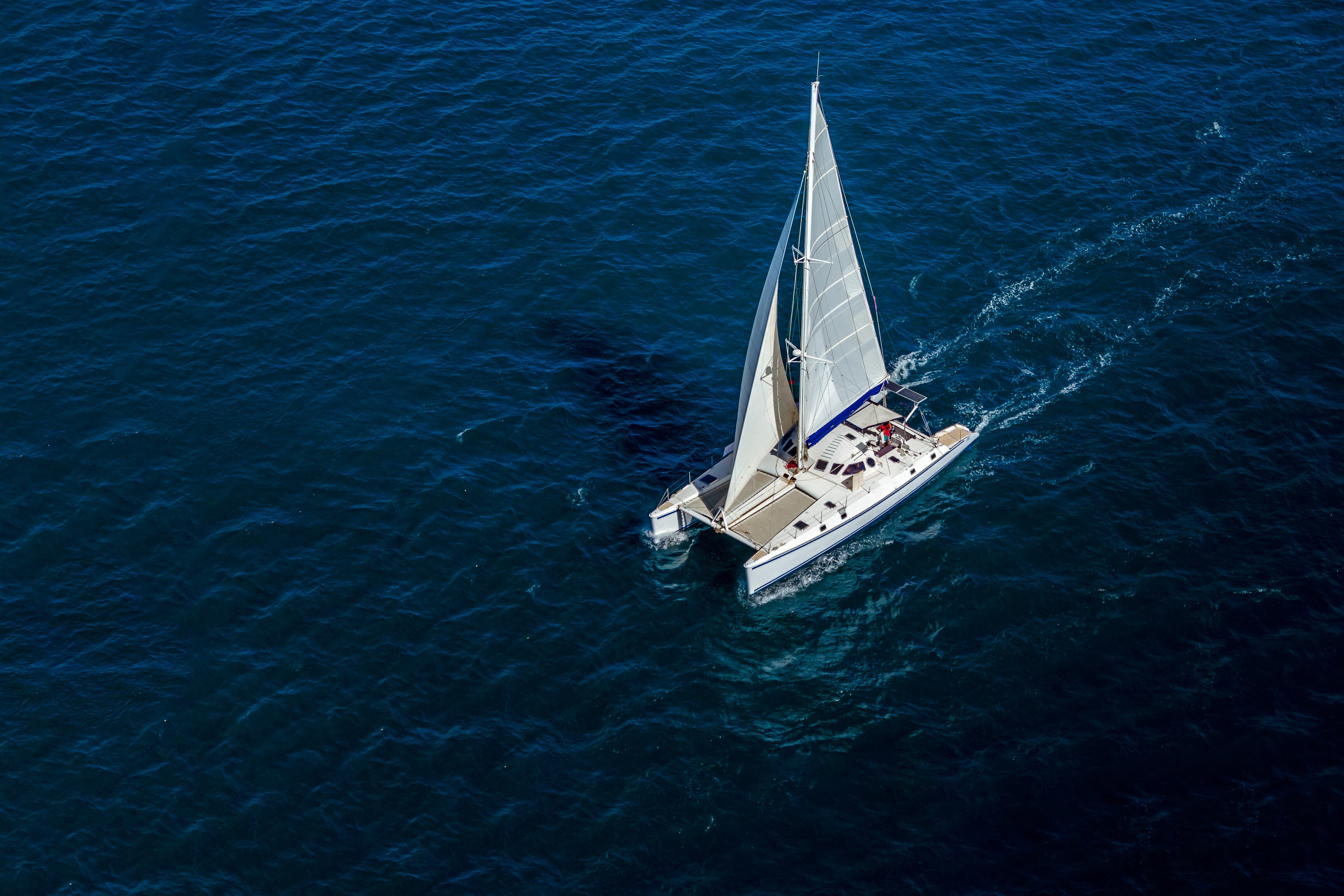 Aerial view of a catamaran sailing in the Indian Ocean