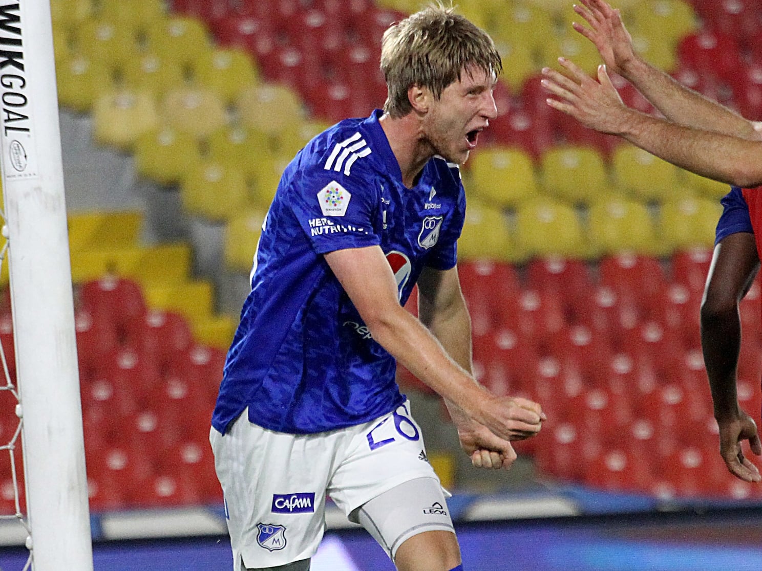 BOGOTÁ. 21 de agosto de 2021. Millonarios derrotó 2-0 al Independiente Medellín en el estadio El Campín, en juego válido por la sexta fecha de la liga Betplay II-2021. En la foto: Andrés Llinas y Daniel Giraldo. (Cortesía Dimayor)